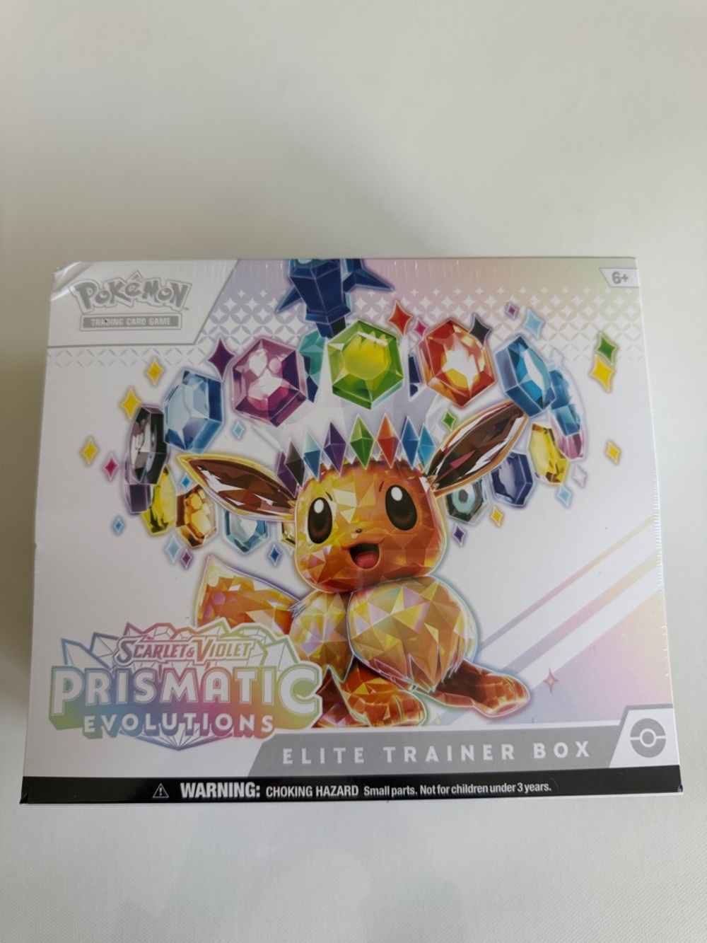 Pokemon Eevee Prismatic Evolutions Elite Trainer Box - White & Rainbow Gems